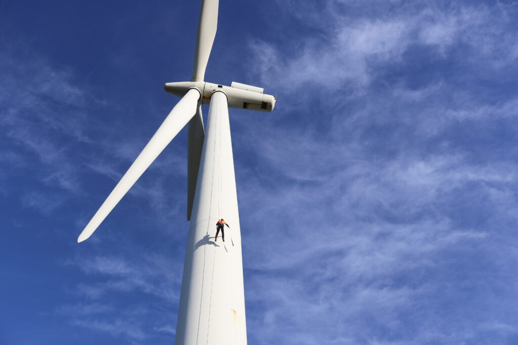 A rope access technician scaling a wind turbine - Approved Andrew Nolan IMG_1756
