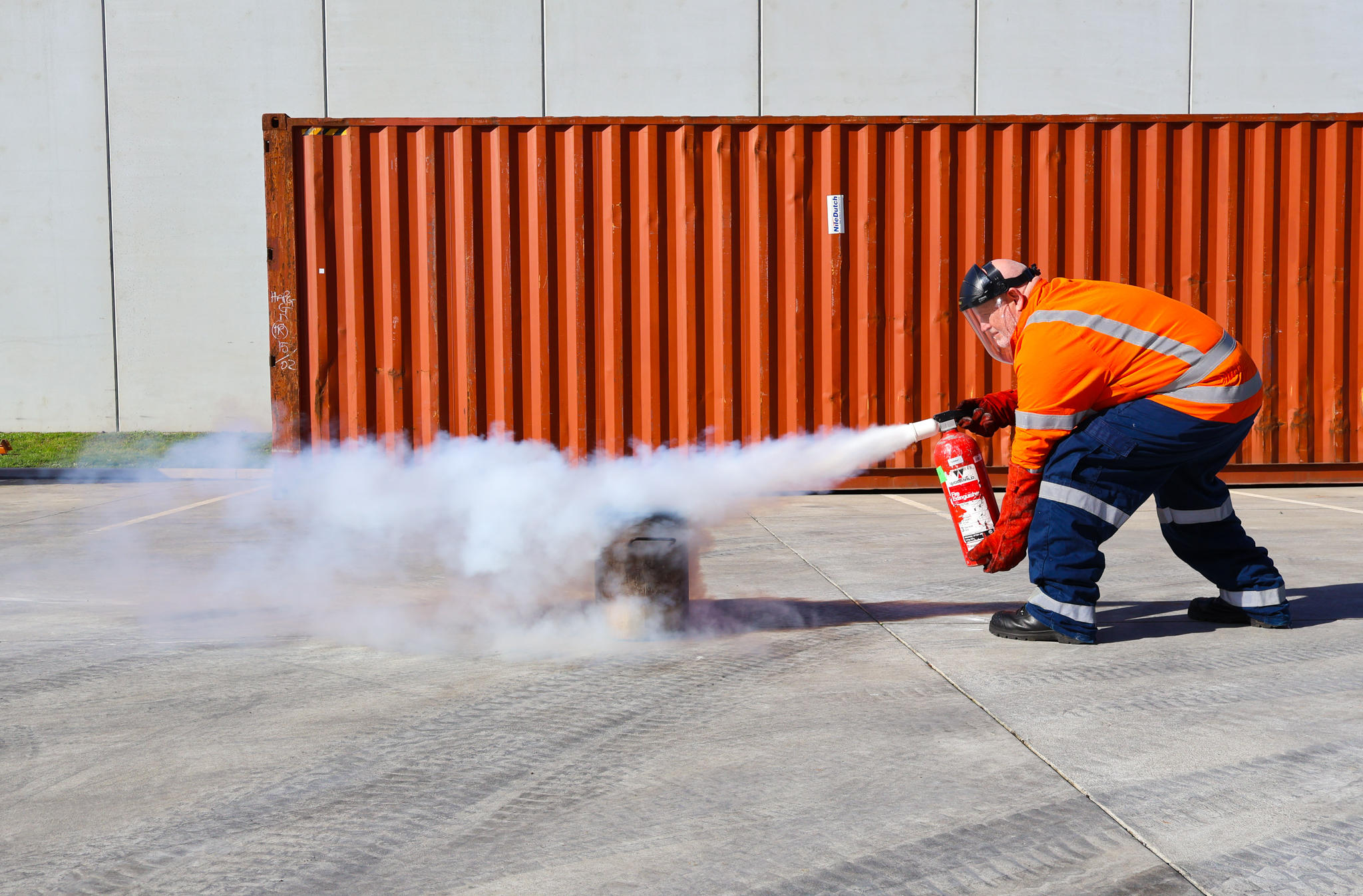 Hero image - A fire extinguisher being used